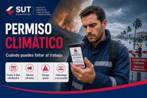 Trabajador consulta una alerta oficial ante una carretera cortada por un incendio y lluvias intensas.